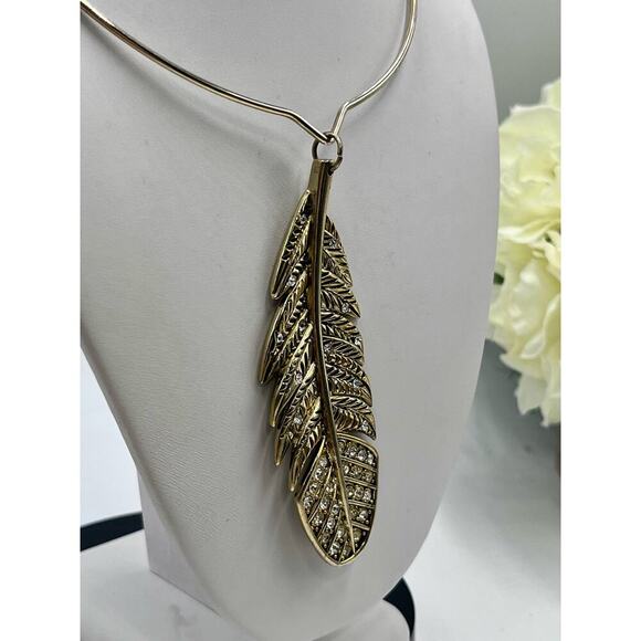 Betsey Johnson Indian Summer Lg
Pave Feather Choker Torque Gold Tone Necklace - Picture 8 of 15